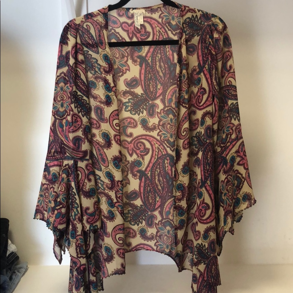 Gimmicks overpiece with 70’s feel